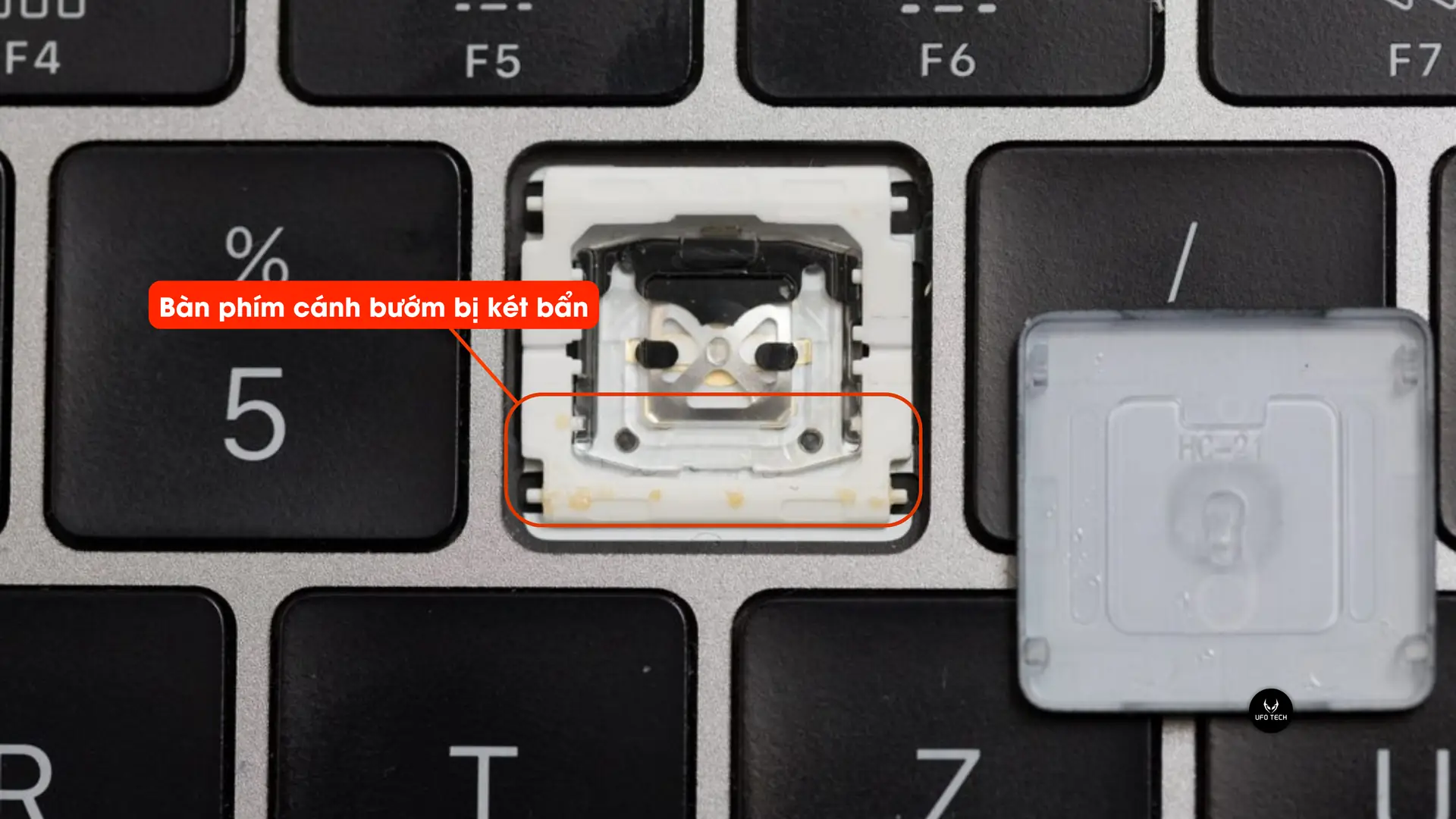 Bàn phím cánh bướm MacBook bị két bẩn gây dính nút khó bấm